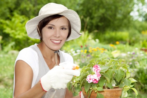 Workers wearing PPE during landscaping maintenance